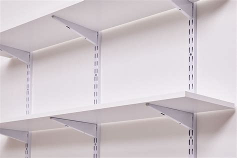 metal standards and brackets|shelving standards and brackets.